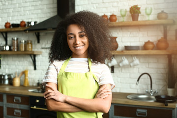 Portrait of African-American woman in kitchen