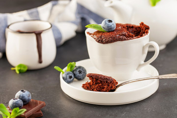 Mug Cake with chocolate and blueberries