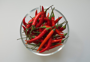 Close-up of red hot chili cayenne peppers handful