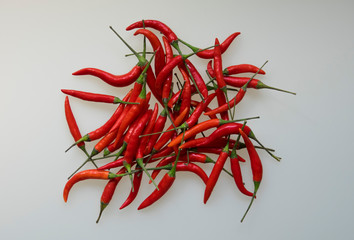 Close-up of red hot chili cayenne peppers handful 
