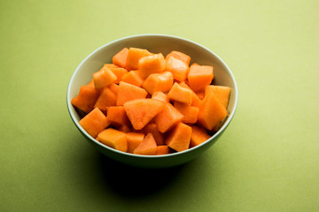 Cantaloupe / muskmelon / kharbuja cut into pieces, served in a bowl. selective focus