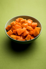 Cantaloupe / muskmelon / kharbuja cut into pieces, served in a bowl. selective focus