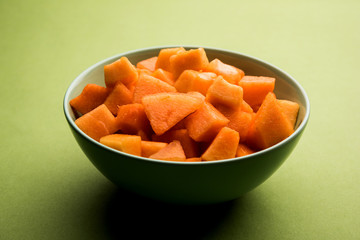 Cantaloupe / muskmelon / kharbuja cut into pieces, served in a bowl. selective focus