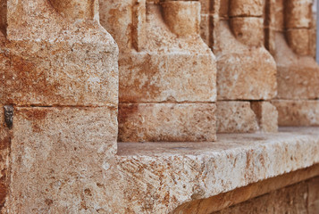 Fototapeta na wymiar Close-up facade of a building with four triangular structures