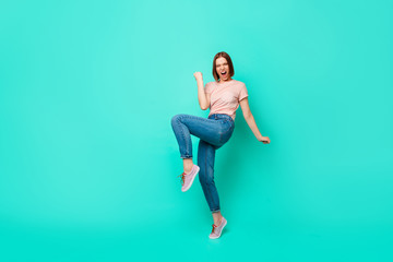 Fototapeta na wymiar Full length side profile body size photo beautiful her she lady yelling loud show wild nature cheerleader competitive mood wear casual jeans denim pastel t-shirt isolated teal turquoise background