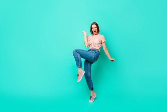 Full length side profile body size photo beautiful her she lady yelling loud show wild nature cheerleader competitive mood wear casual jeans denim pastel t-shirt isolated teal turquoise background
