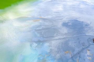 Aerial view of chemical residuals flooding a lake from a copper mine exploitation