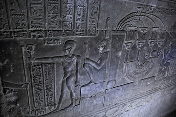 Hieroglyphic carvings and paintings on the interior walls of the temple