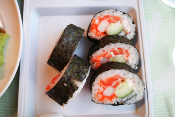 Sushi maki rice and seaweed with salmon Crab Stick and cucumber