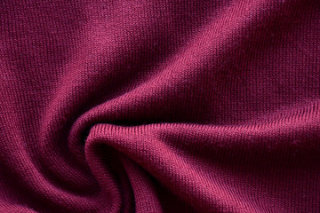 Purple texture of a knitted English elastic pattern