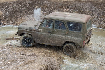 Russian SUV, Off-road vehicle slips, Stuck in the river	