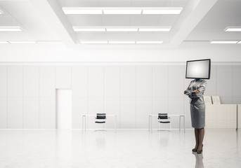 Business woman with TV instead of head.
