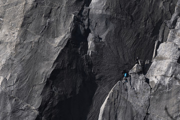Climbers attempt to climb jagged granite of El Capitan in Yosemite National Park