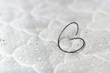 Hole in old dirty leaky couch. Spring in old bed mattress with pills. Need of repair or replacement...