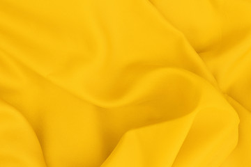 Yellow fabric texture for background and design art work, beautiful pattern of silk or linen.