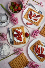 Homemade belgian Waffle. Strawberies and whiped cream.