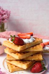 Homemade belgian Waffle. Strawberies and whiped cream.