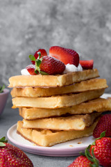 Homemade belgian Waffle. Strawberies and whiped cream.