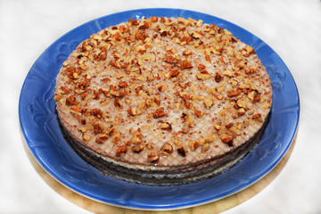 Waffle cake with condensed milk and walnuts