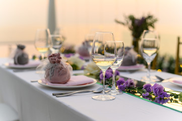 Table setting at a luxury wedding and Beautiful flowers on the table.