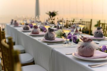 Table setting at a luxury wedding and Beautiful flowers on the table.