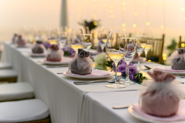 Table setting at a luxury wedding and Beautiful flowers on the table.