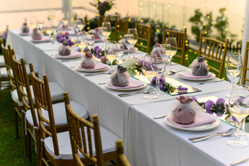 Table setting at a luxury wedding and Beautiful flowers on the table.