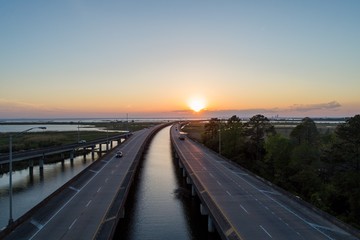 Fototapeta premium Aerial view of Mobile Bay at sunset 