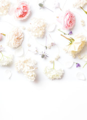 Festive flower composition on the white background. Overhead view