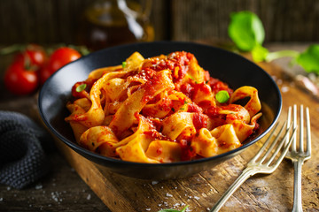 Tasty italian pizza with tomato sauce and parmesan