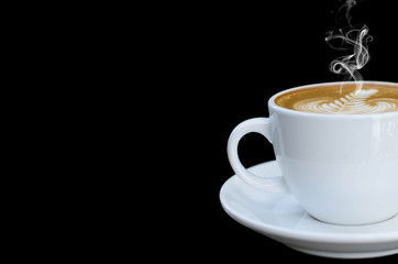 White cup of hot coffee isolated on black background