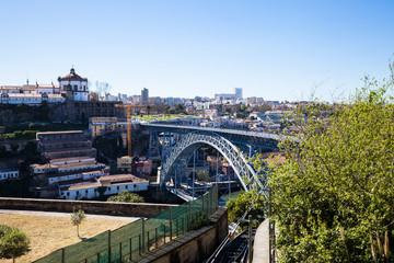 Porto city panorama with Douro River and bridge on a sunny day