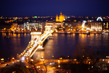 Fototapeta na wymiar Colorful bokeh background of night. cityscape. Budapest city with famous chain bridge at night, Hungary