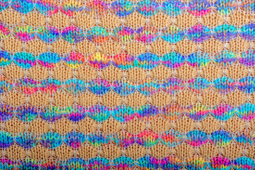 Obraz premium Abstract background. Colored knitted fabric texture, horizontal lines, flat lay