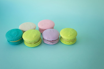 colorful macaroons on a blue background