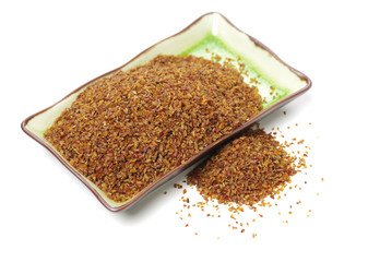 black bitter buckwheat tea on white background