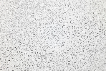 Water drops on glass, Rain droplets on glass background.