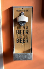 beer opener on wall