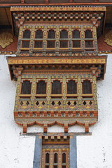 Fototapeta na wymiar Facade decoration of buddhist monastery in Bhutan