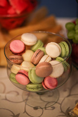 Delicious colored macaroons in crystal vase