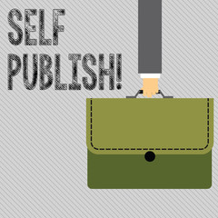 Text sign showing Self Publish. Business photo showcasing writer publish piece of ones work independently at own expense Businessman Hand Carrying Colorful Briefcase Portfolio with Stitch Applique