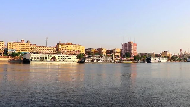 Sailing on the Nile river at sunset in Aswan, Egypt