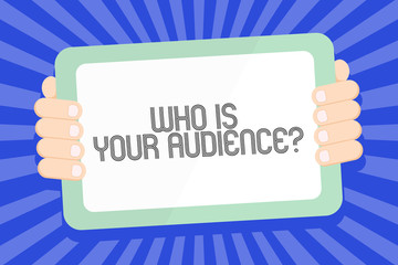 Text sign showing Who Is Your Audience Question. Business photo text who is watching or listening to your speech Color Tablet Smartphone with Blank Screen Handheld from the Back of Gadget