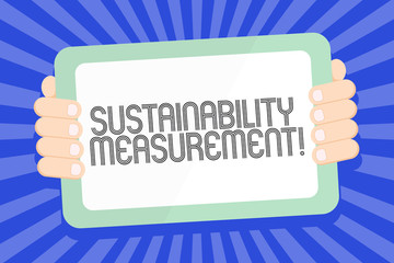 Text sign showing Sustainability Measurement. Business photo text measure environmental social and economic domains Color Tablet Smartphone with Blank Screen Handheld from the Back of Gadget