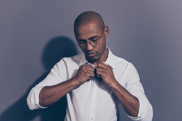 Close up photo amazing stunning dark skin he him his macho arms hands button up strict clothes office preparation perfect look boss chief shaved face wear specs white shirt isolated grey background