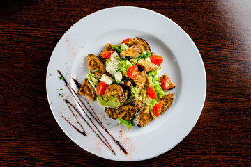 Baked Eggplant Plate Dressed with Parsley and Tomato