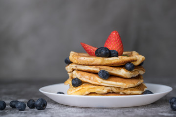Pancakes on white plate