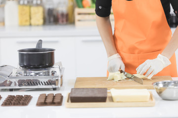 Woman making chocolate