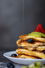 Honey on pancakes