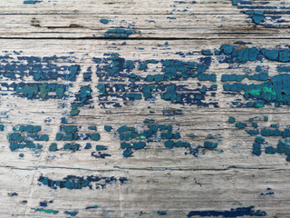 Fototapeta na wymiar The texture of an old blue wooden wall. Vintage background